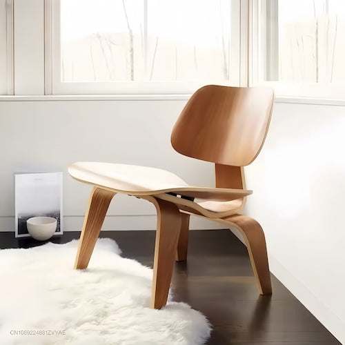 Eames Molded Plywood Lounge Chair in a contemporary room, showcasing its mid-century modern design.