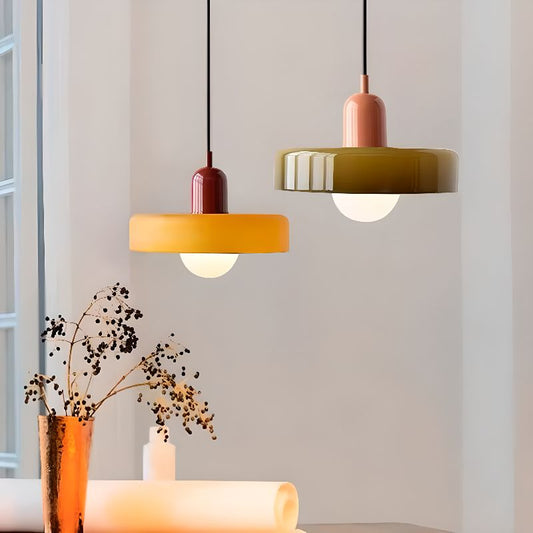 Glass pendant lighting with customizable length in contemporary design, available in vibrant colors, ideal for residential and commercial spaces.