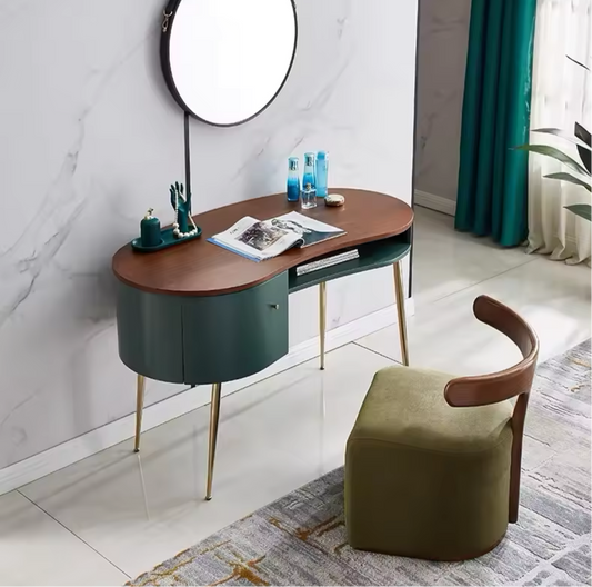 Accent chair in green fabric with wooden backrest, placed next to an elegant vanity table in a modern living room.