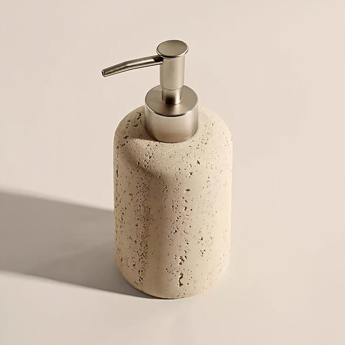 Travertine 4-piece bathroom set with toothbrush holder, tumbler, dispenser, and tray in cream color