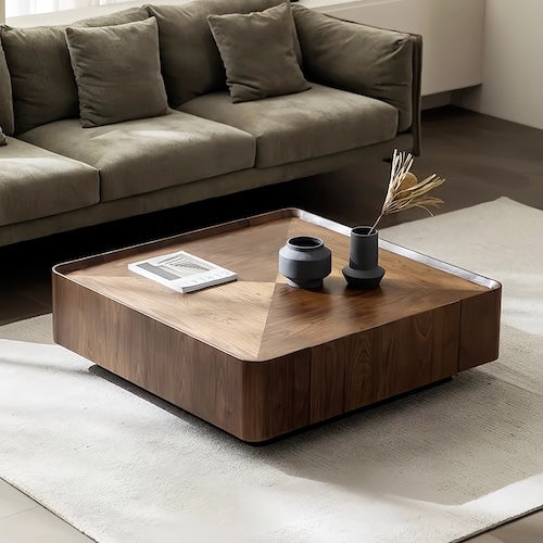 Walnut coffee table with storage and concave tabletop in a modern living room setting - motivodecor.com