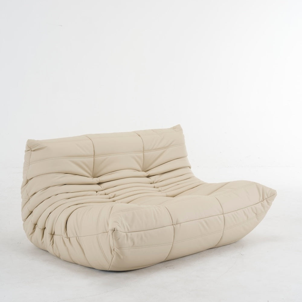 Beige bean bag chair on a white background