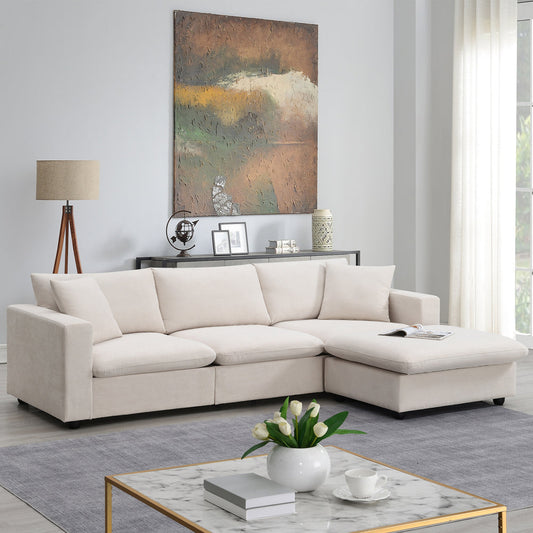 L-shaped modern sectional sofa with convertible ottoman in a stylish living room setting.