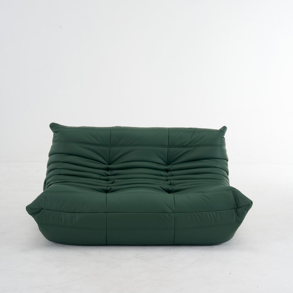 Green bean bag chair on a white background