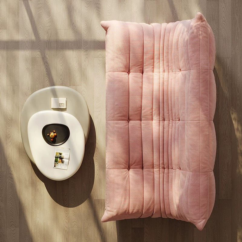 ligne roset togo pink couch in corduroy - motivodecor.com