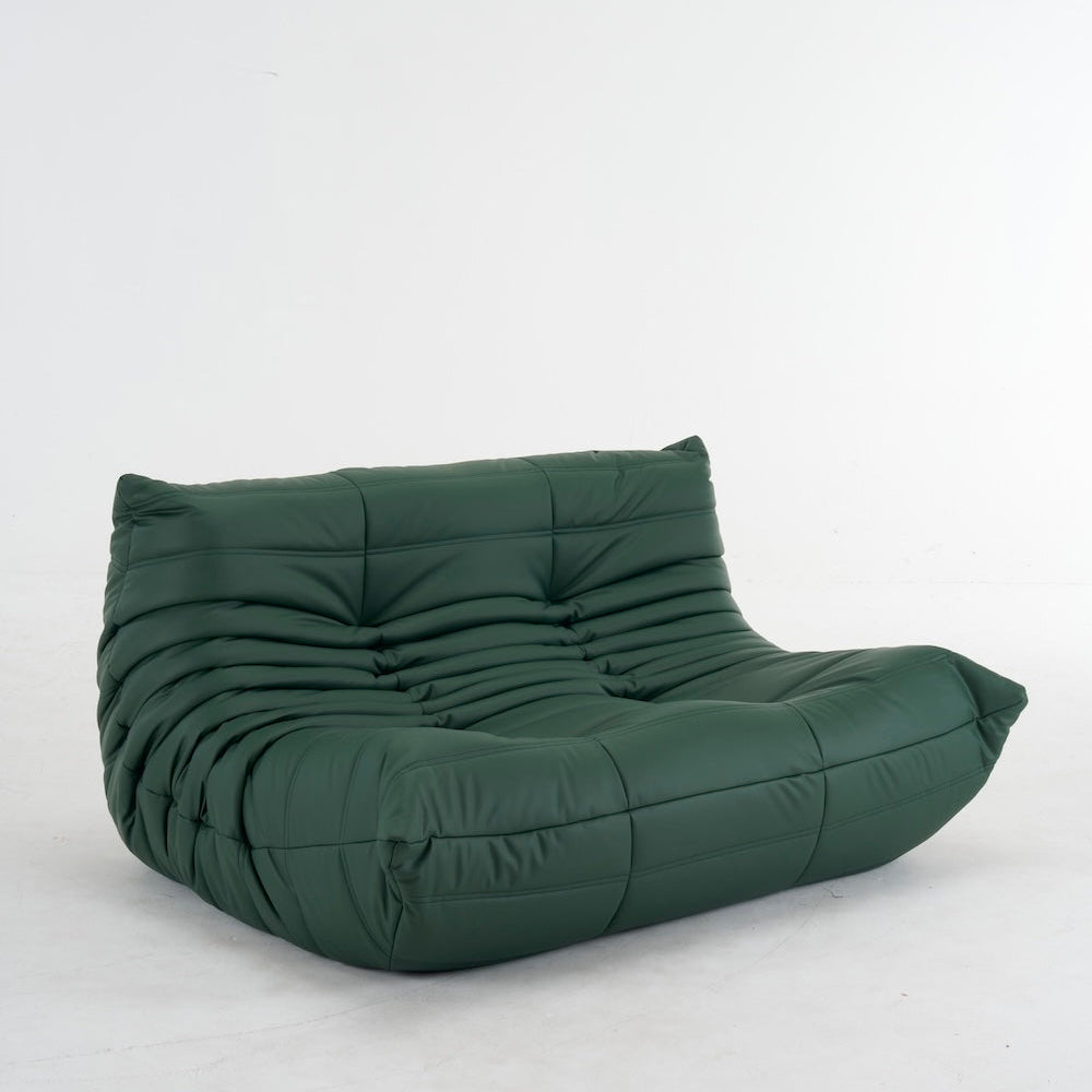 Green bean bag chair on a white background