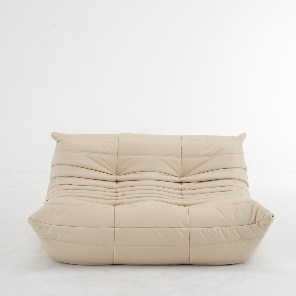 Togo Loveseat Sofa in beige microfiber leather with ergonomic design and cushy comfort