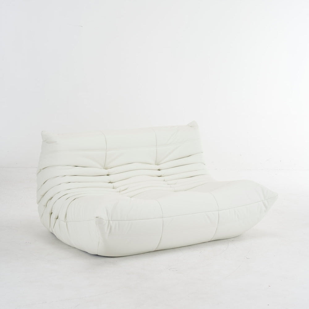 White quilted bean bag chair on a white background