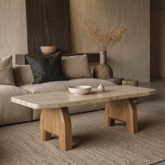 Vintage wabi-sabi style rectangular travertine coffee table with natural wood legs and rounded corners