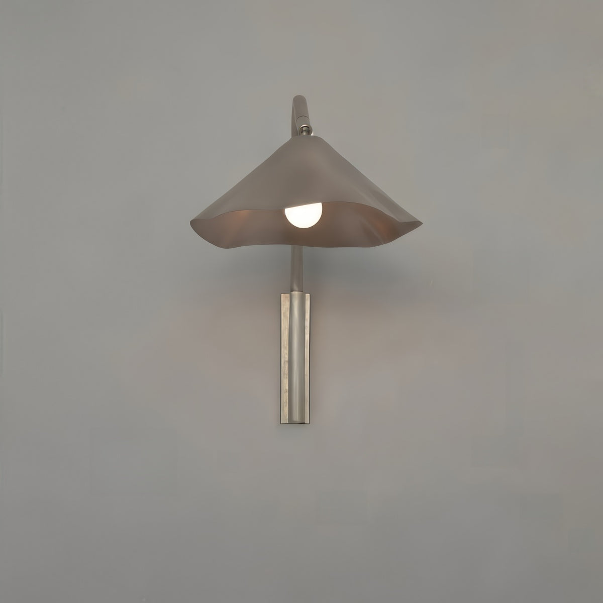 Antica Wall Lamp with Spanish Bauhaus mid-century design, aluminum forged body, warm layered LED light for living rooms, studies, and bedrooms