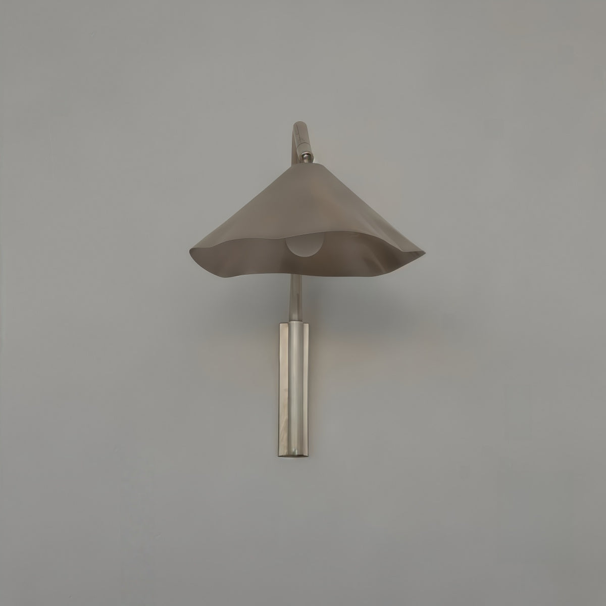Antica Wall Lamp with Spanish Bauhaus mid-century design, aluminum forged body, warm layered LED light for living rooms, studies, and bedrooms