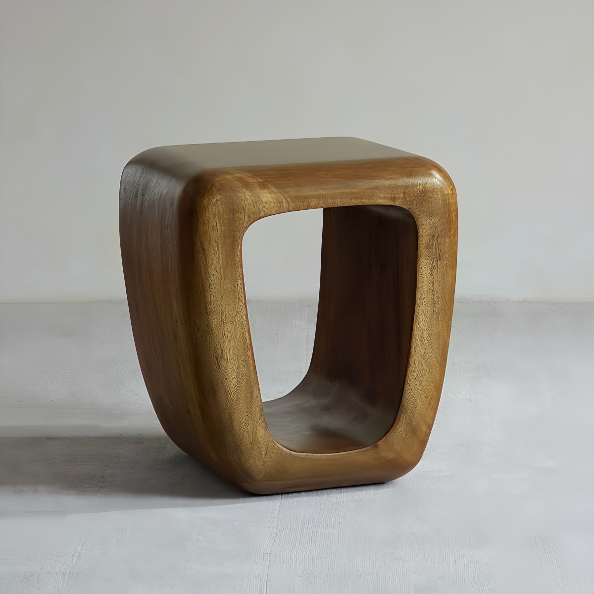 Solid Wood Side Table with smooth rounded edges, warm natural wood finish, and distinctive hollow square shape in solid wood.