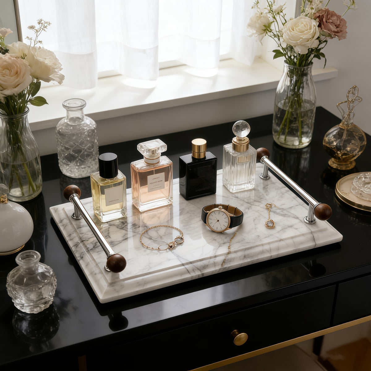 Elegant natural marble tray with black and white veining for organizing scented candles and home decor.