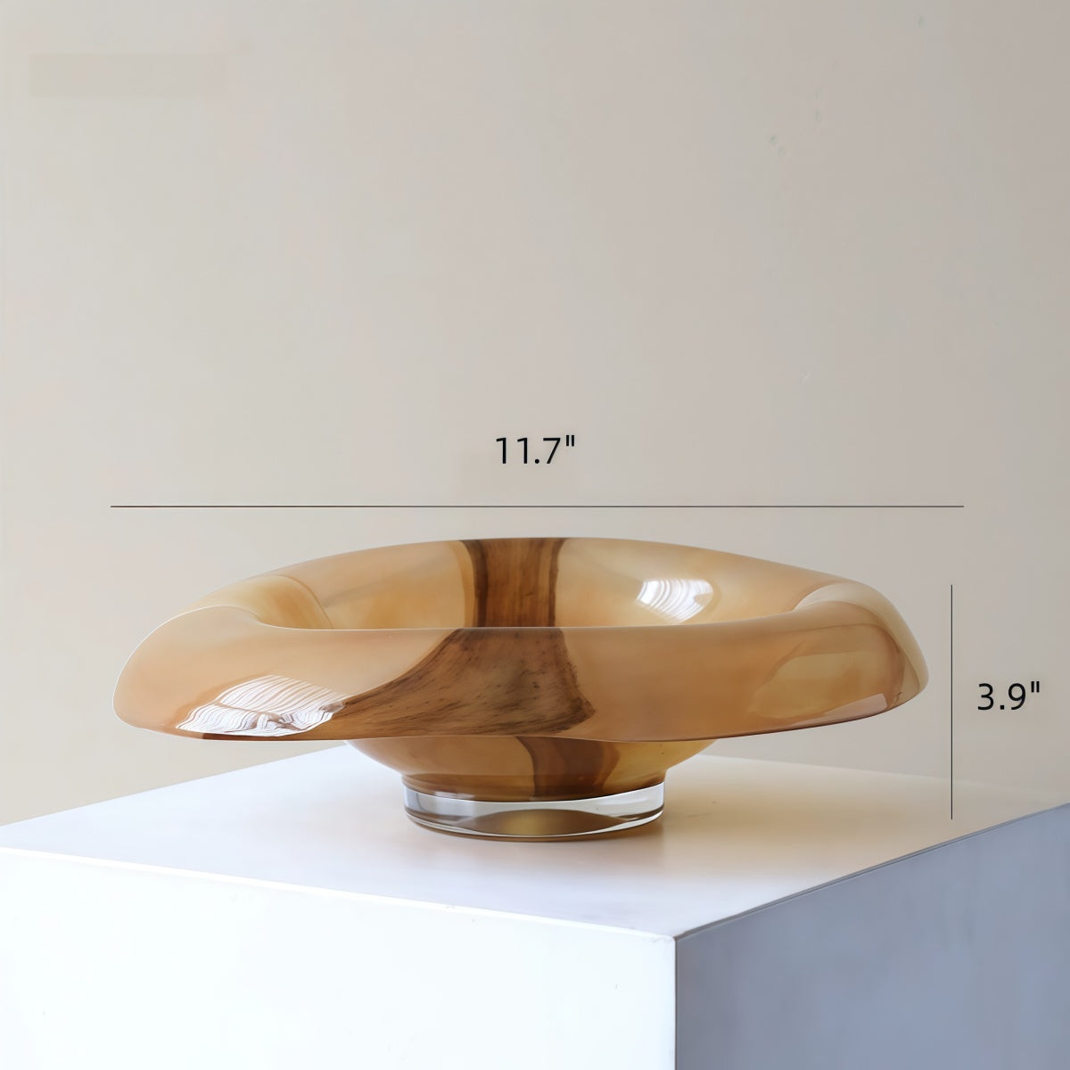 Handcrafted mid-century glass fruit platter with deep brown ripple design on coffee table