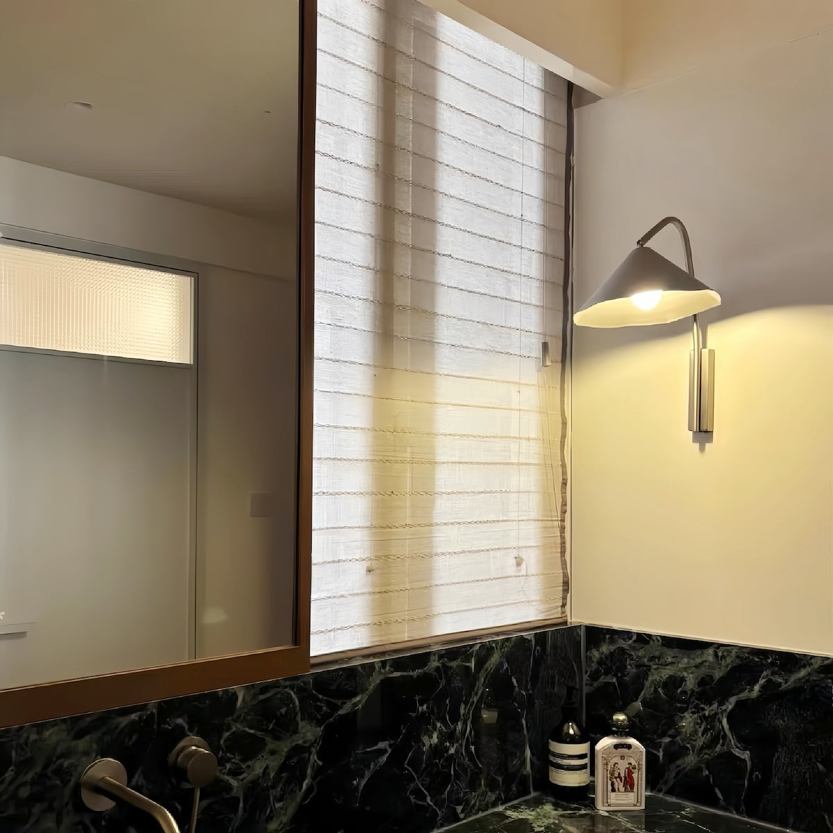 Antica Wall Lamp with Spanish Bauhaus mid-century design, aluminum forged body, warm layered LED light for living rooms, studies, and bedrooms