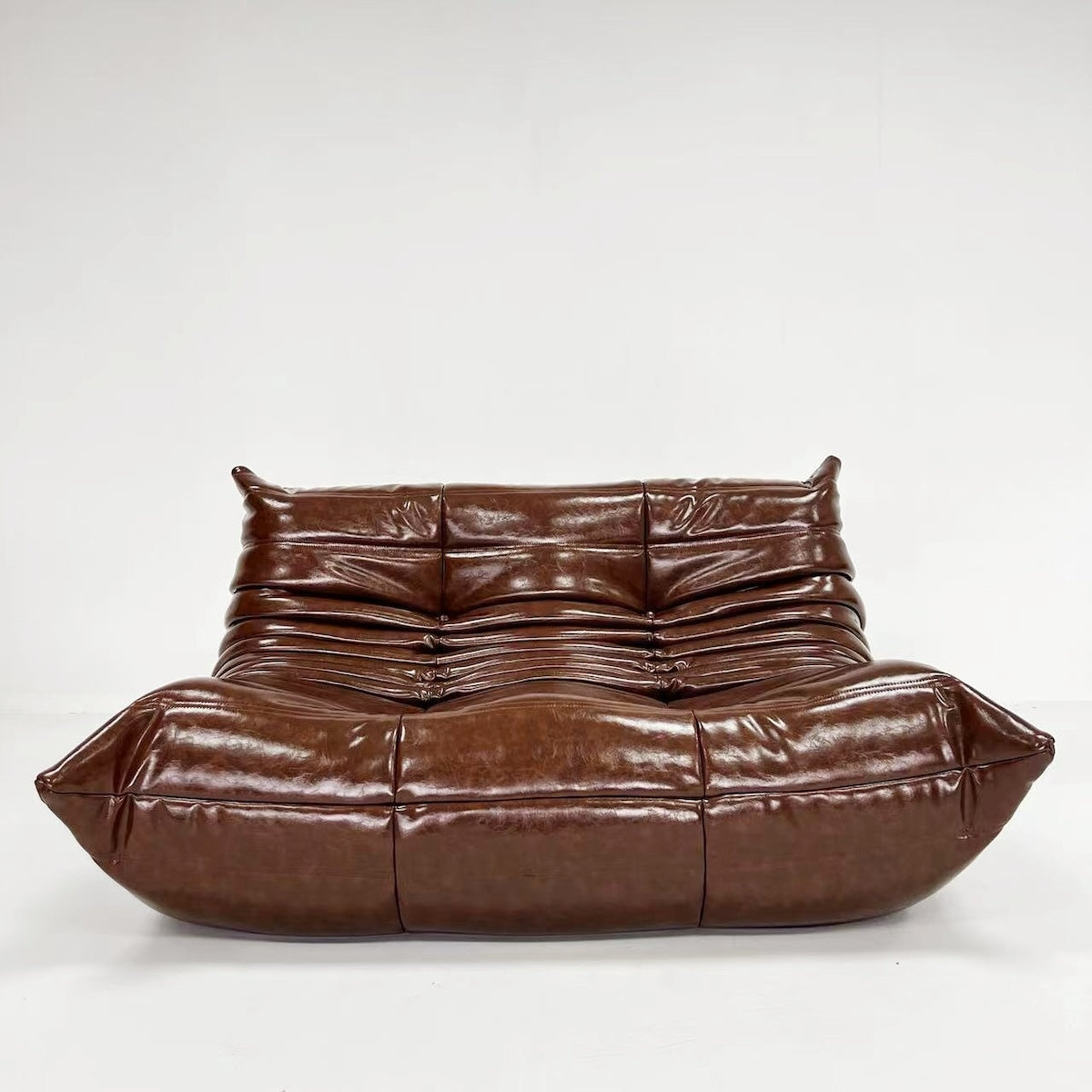 2 seater togo sofa in oil wax leather - motivodecor.com