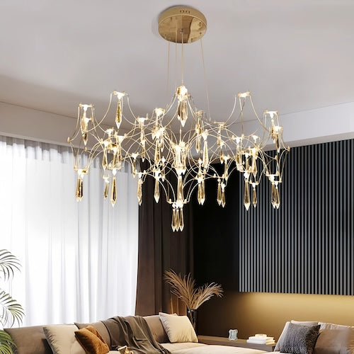 Stylish LED crystal chandelier illuminating a dining area with modern elegance - motivodecor.com