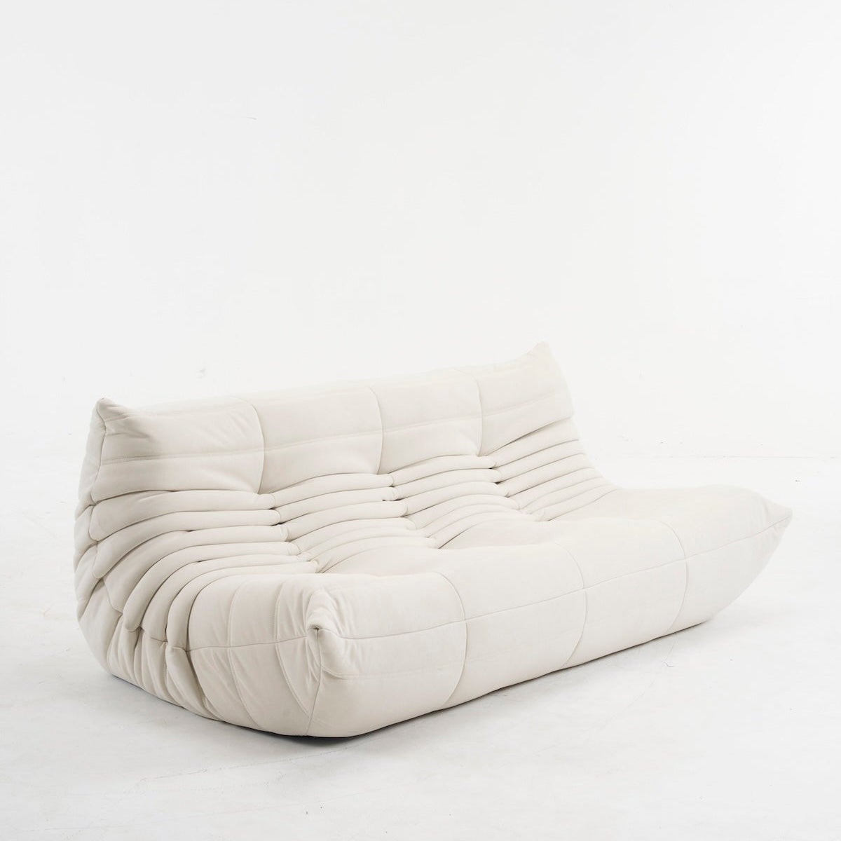 Beige togo 3 seater sofa in suede