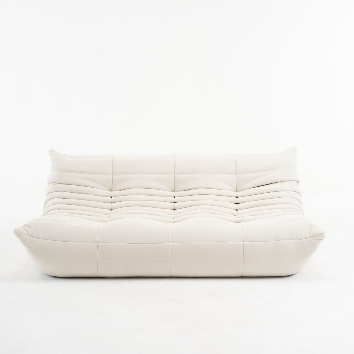 Beige togo couch in suede