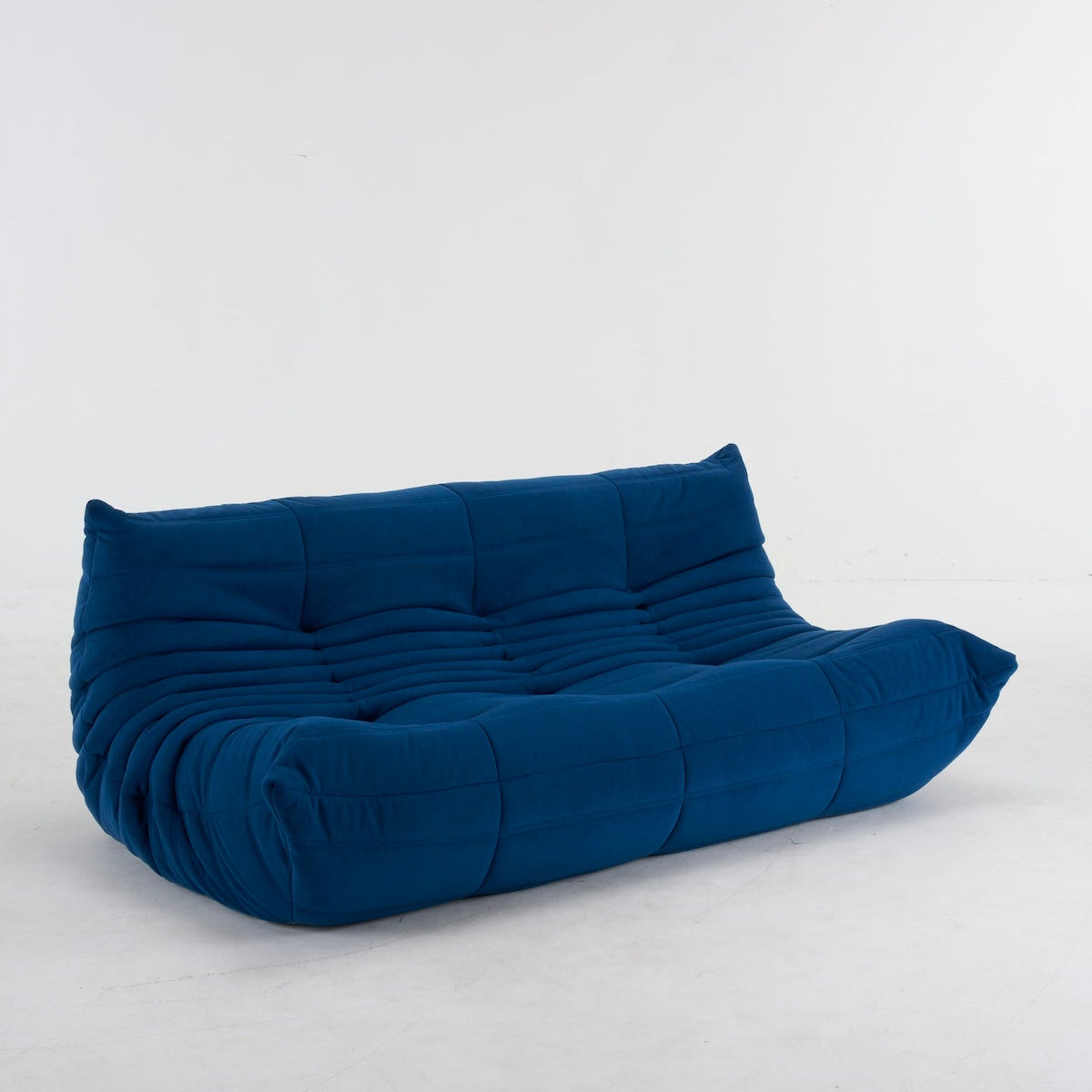 Blue bean bag sofa in suede