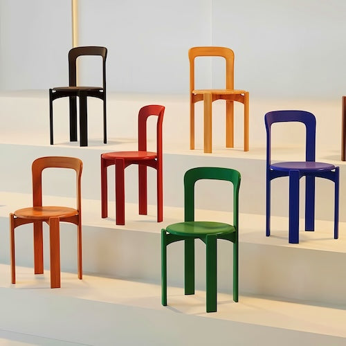 Colorful solid beech wood dining chairs on display; eco-friendly and stylish.