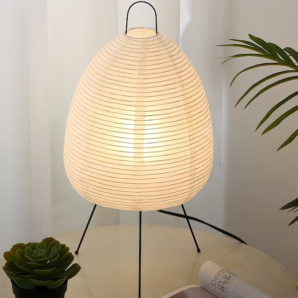 Traditional Japanese Rice Paper Lamp with iron tripod, illuminating a warm and inviting atmosphere.