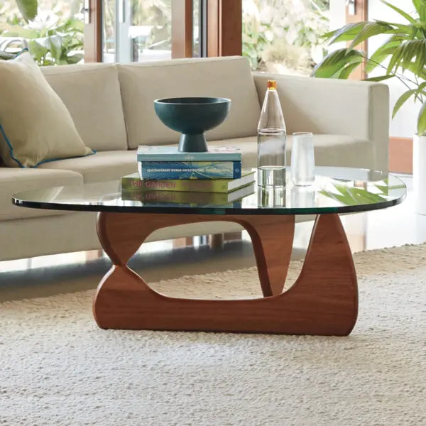 Noguchi Table Replica with interlocking wood base and glass top in modern living room - motivodecor.com