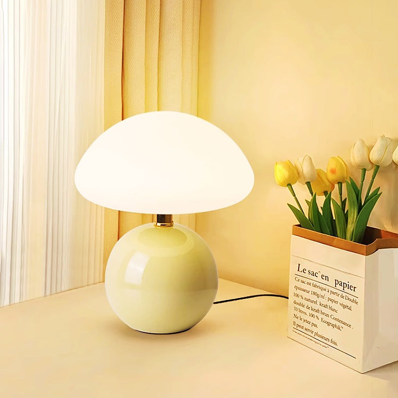 Ceramic table lamp with LED light on a cozy bedside table - motivodecor.com