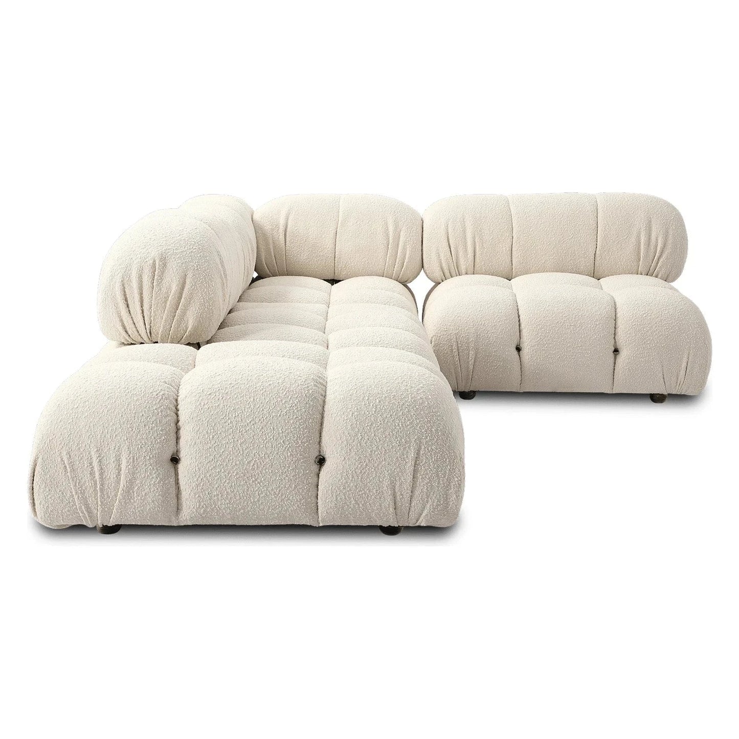 Modular sofa sectional with flexible velvet fabric modules in cream color, customizable for living room setup.