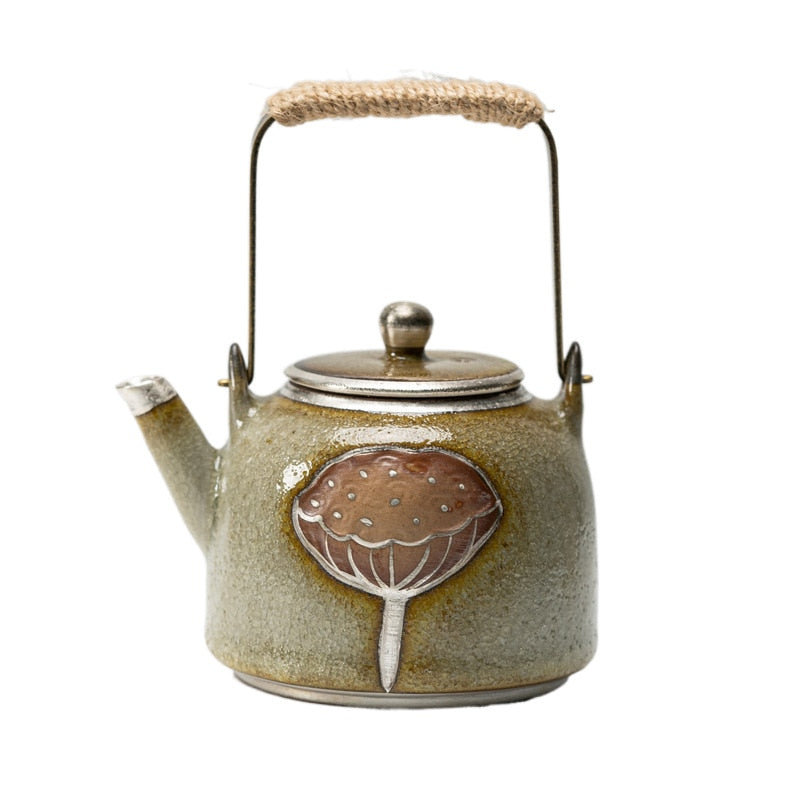 Exquisite ceramic teapot from the Tea Gift Set with delicate design, 400ml capacity.