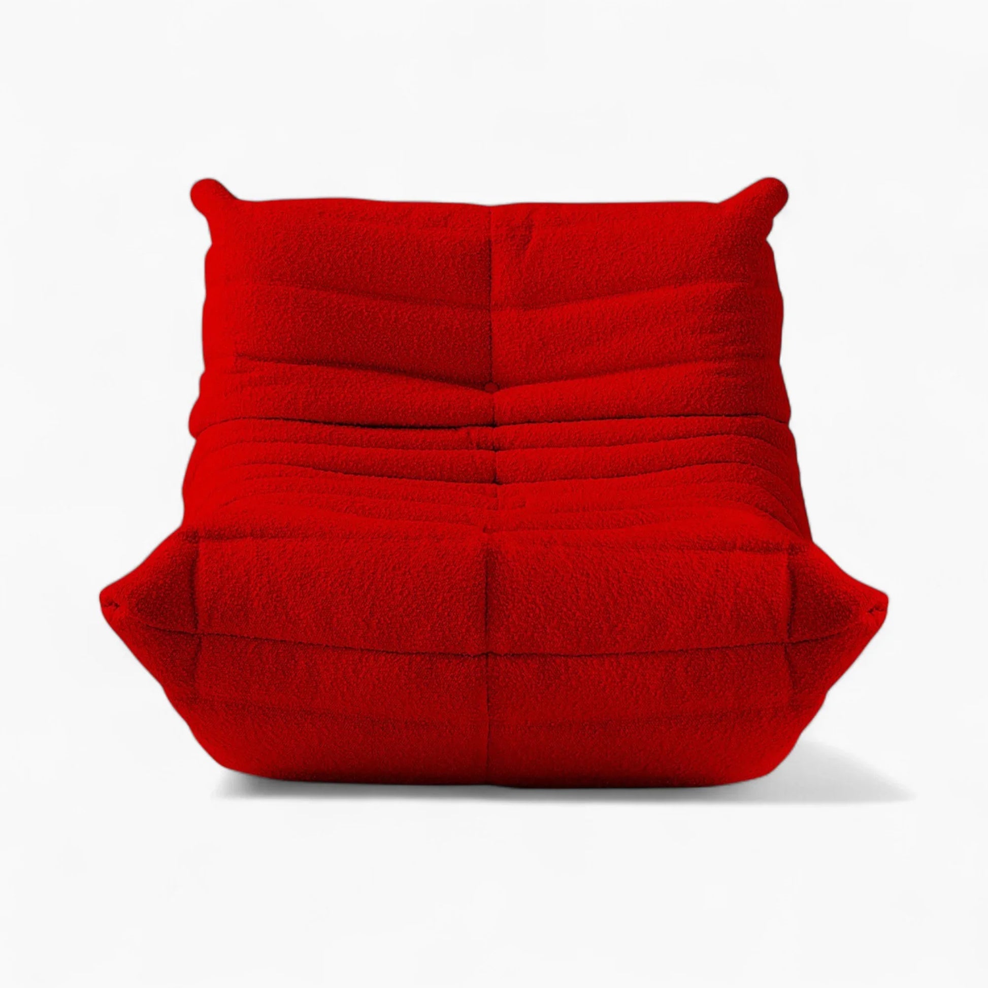 Red Togo Fireside Chair replica upholstered in textured bouclé fabric with ergonomic, quilted design by Michel Ducaroy