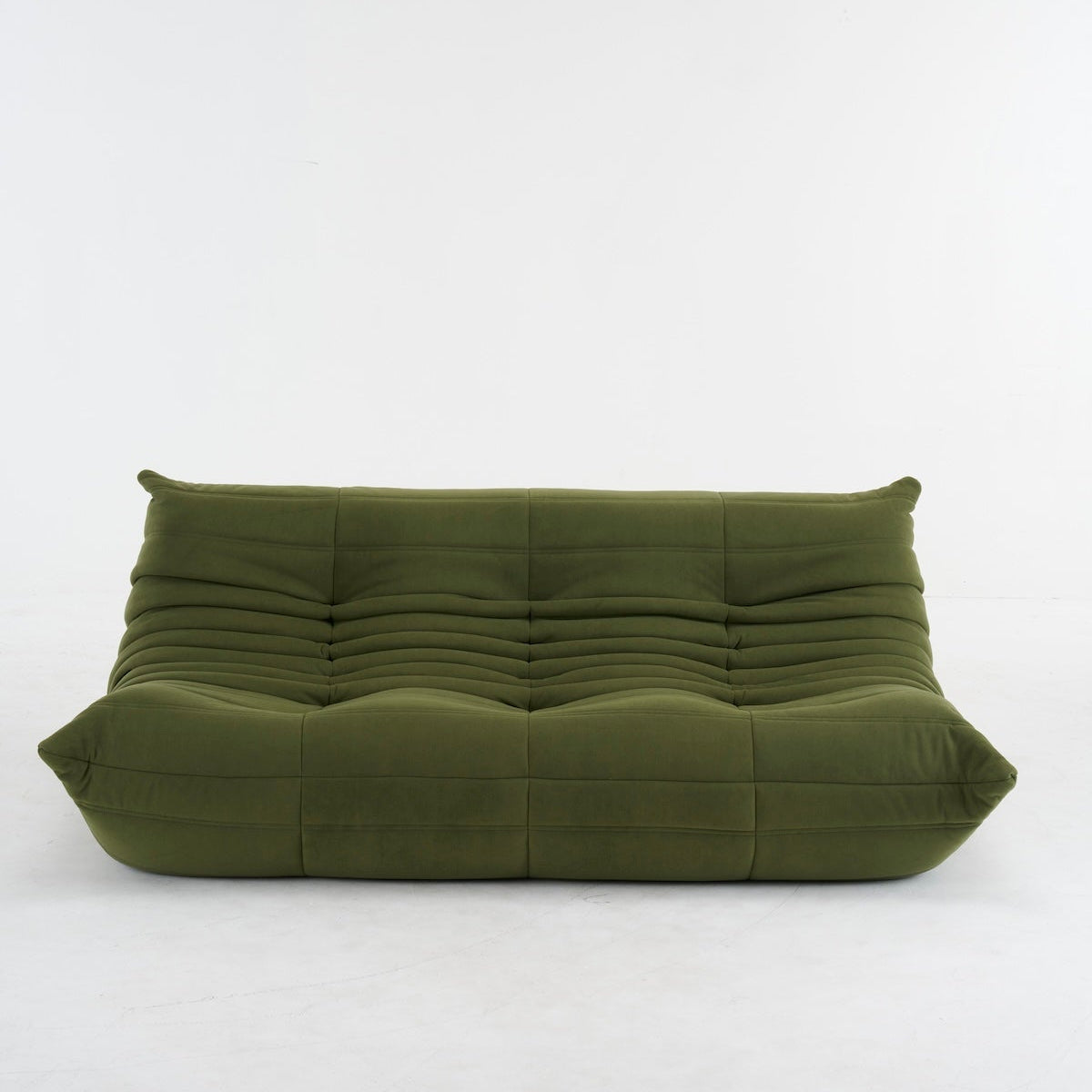 Togo Vintage Green couch in suede