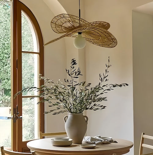 Wabi-Sabi rattan pendant light in a serene dining room setting with natural decor.