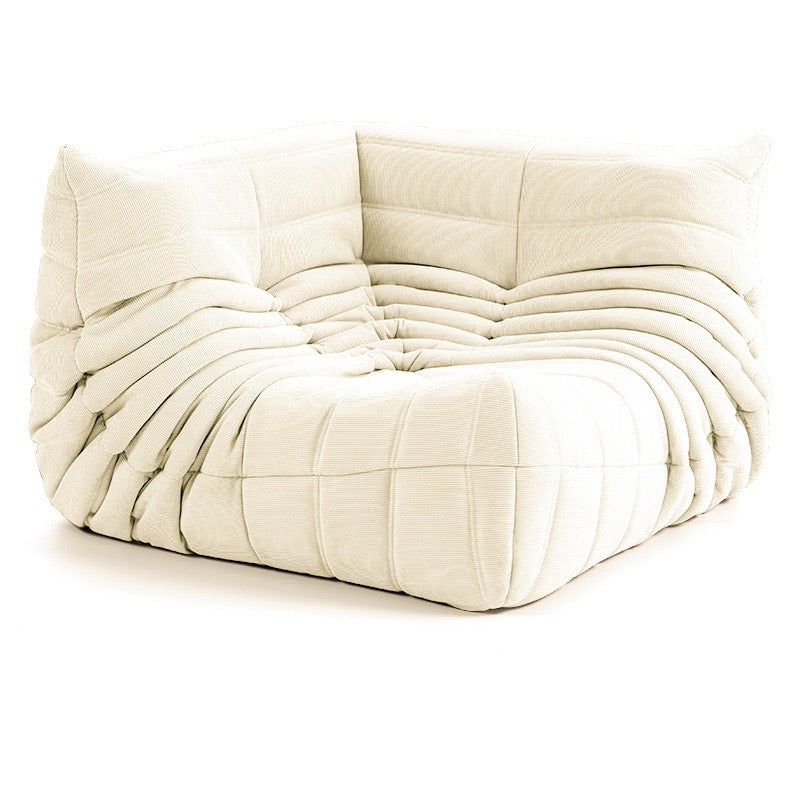 Luxurious Suede Togo Corner Sofa in beige, offering stylish comfort for modern living rooms - motivodecor.com