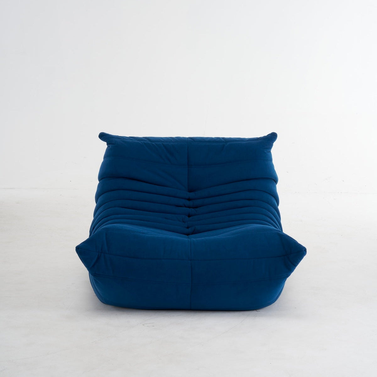 Blue bean bag chair on a white background