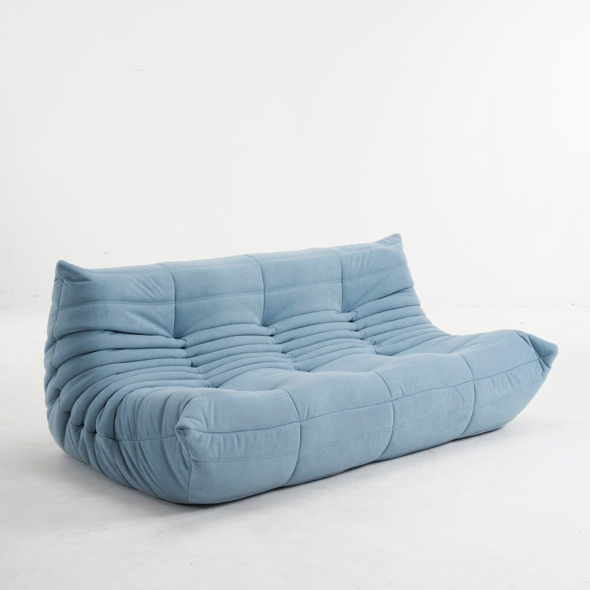 Blue bean bag chair on a white background