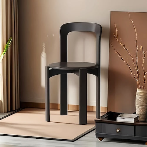 Eco-chic beech wood dining chair in black finish in modern room.