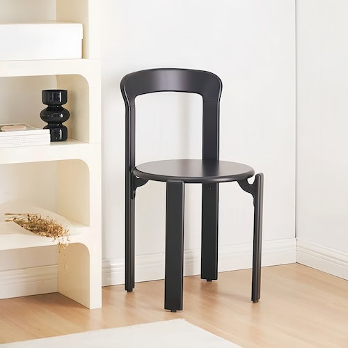 Elegant black beech wood dining chair in a modern room setting.