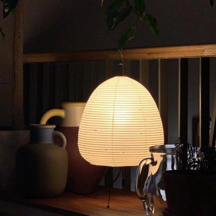 Traditional Japanese rice paper lamp with wooden frame, emits warm light, ideal for modern and Wabi-sabi decor - motivodecor.com