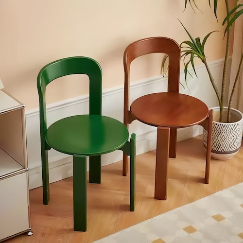 Eco-friendly beech wood dining chairs in green and walnut colors.