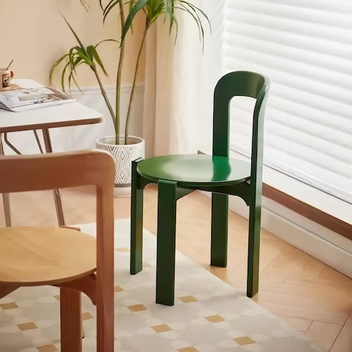 Eco-friendly beech wood dining chair in green, perfect for modern interiors.