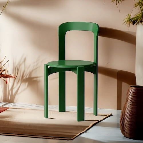 Eco-friendly beech wood chair in bold green with a sleek design.