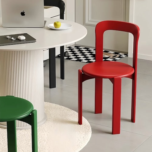 Eco-friendly solid beech wood dining chair in bold red color, featuring a classic silhouette for comfort and style.