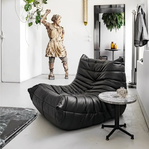 Togo Chair Fiber Leather Replica by Michel Ducaroy in a modern living space - motivodecor.com