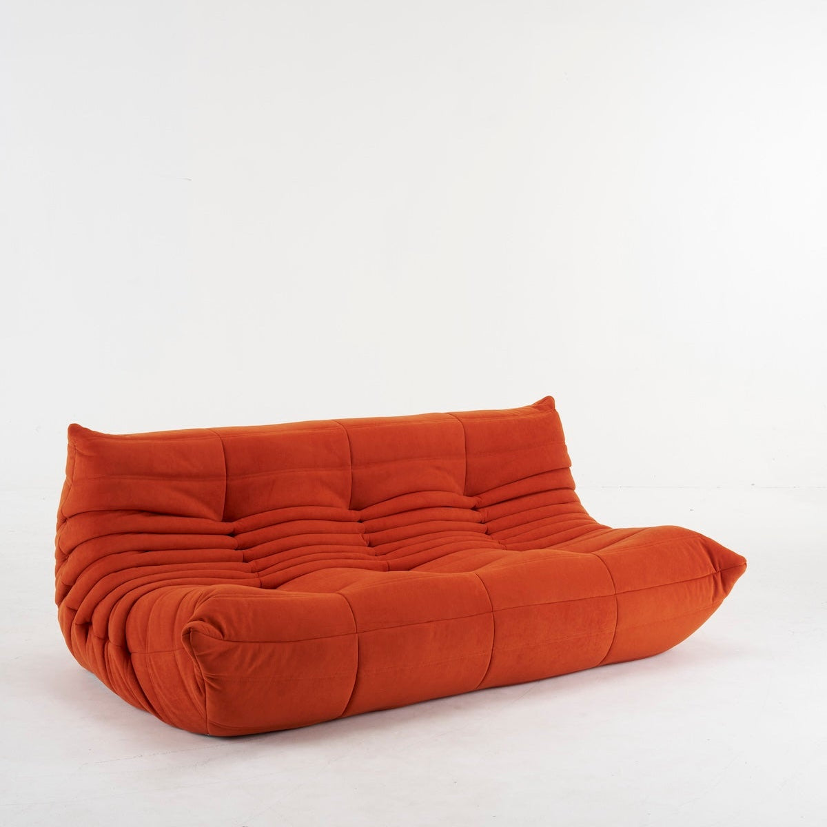 togo orange 3 seater couch in suede