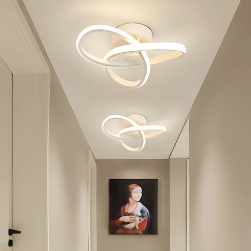 Modern LED ceiling chandelier lamp illuminating hallway, contemporary design, energy-efficient ceiling lighting.